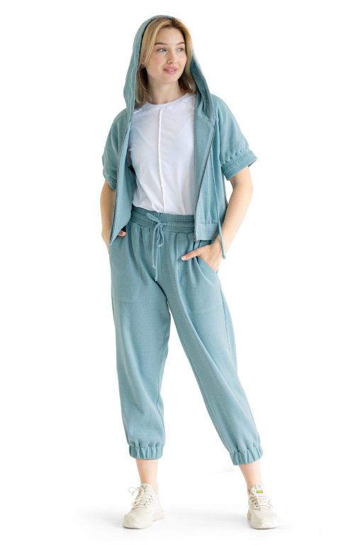 Штани вкорочені з манжетом та накладними кишенями з трикотажной вафлі тіфані кольору