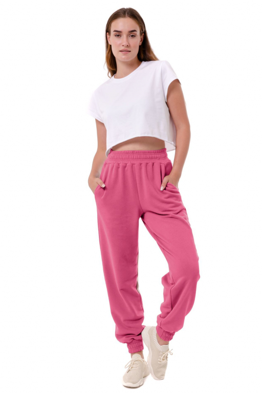 Штани вільного крою с манжетом на резинці внизу у малиновому кольорі