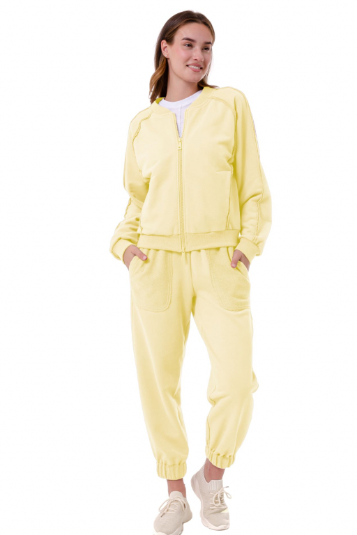 Класична кофта з рукавом реглан у новому виконанні з відкритими швамиу у лимонному кольорі