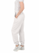 Штани вільного сілуету з манжетами на резинці та шнурком у поясі білого кольору