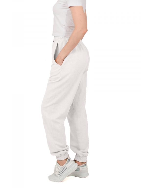 Штани вільного сілуету з манжетами на резинці та шнурком у поясі білого кольору