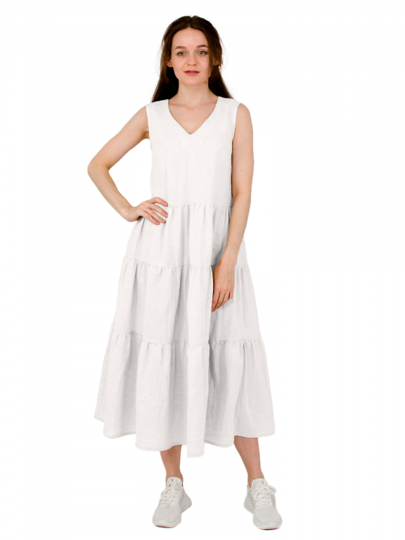 Сукня довга з трьома ярусами воланів та боковими кишенями з поясом білого кольору